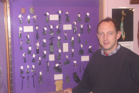 Ian with a fine selection of whalebone and jade pendants